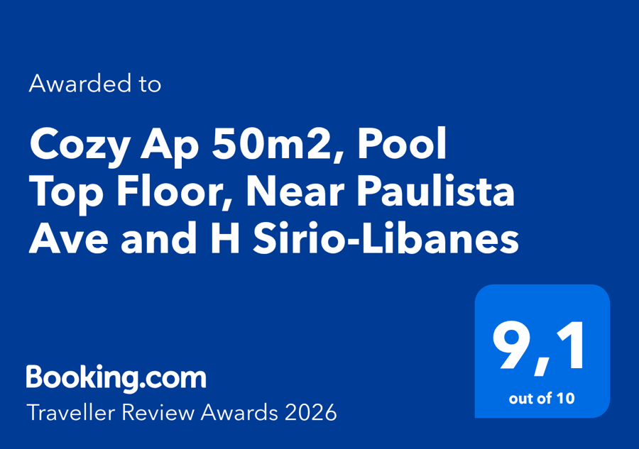 Selo Booking.com Traveller Review Awards 2026 concedido ao Cozy Ap, com nota 9,1 de 10